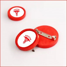 Doctor badge, red colour, wooden
